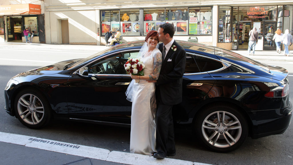 Bride and Groom with Tesla in San Francisco