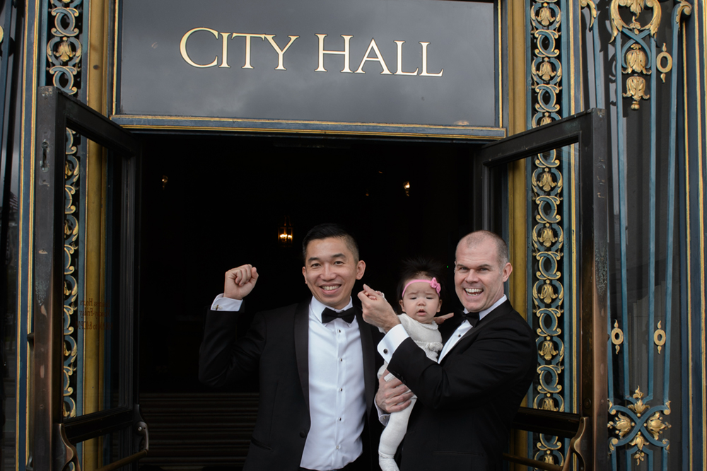city hall sign with baby