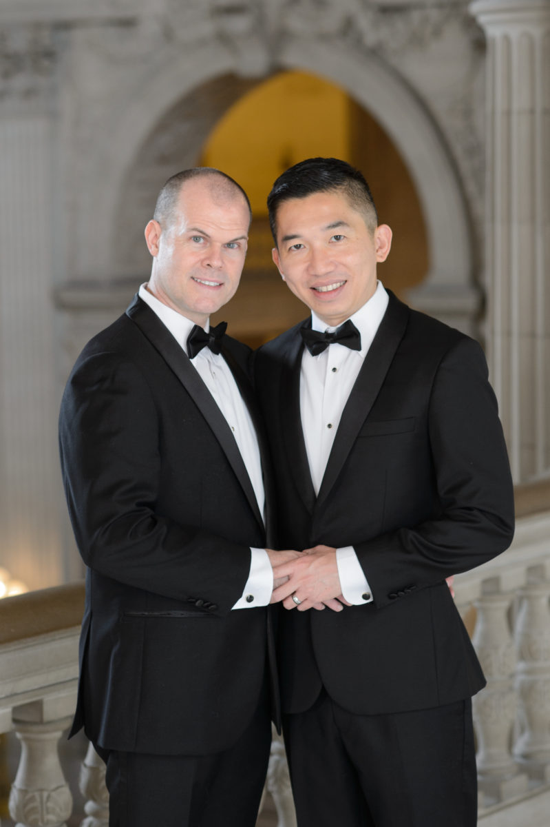 Same-Sex Grooms posing with the Rotunda in the background