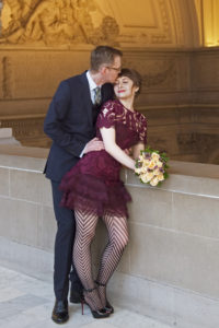 Romantic kiss from groom to bride