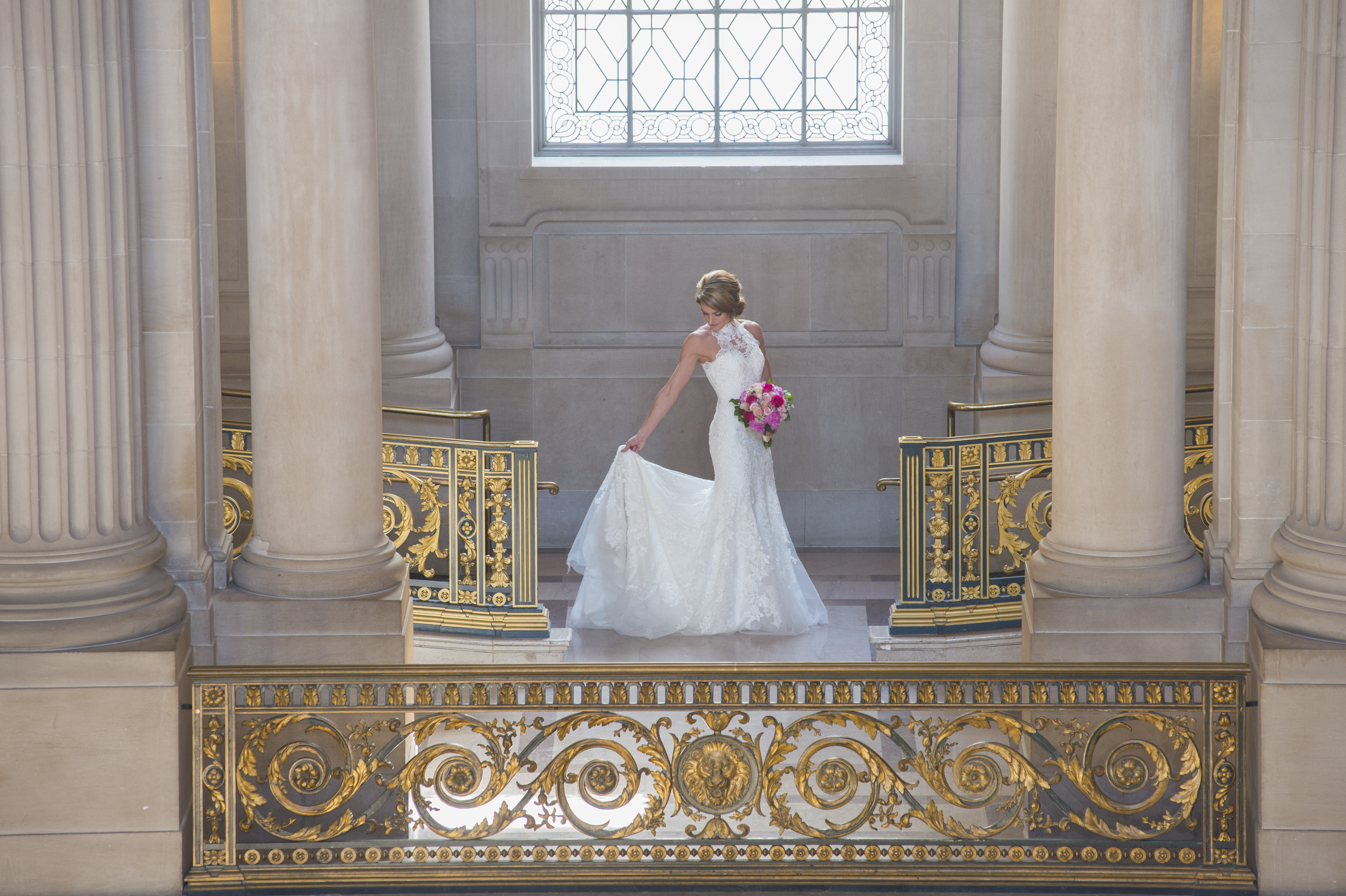 City Hall bride checks her wedding gown