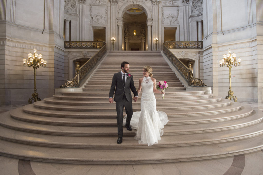 Bride and Groom walking down the Grand Staircase