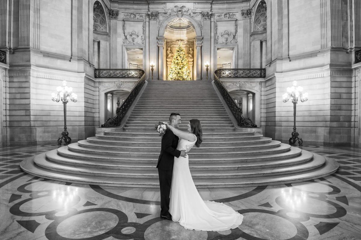 The Grand Staircase at Christmas time. A mix of black and white and color in San Francisco.
