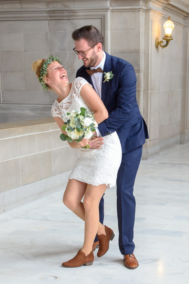 Laughing while posing for pictures at SF city hall