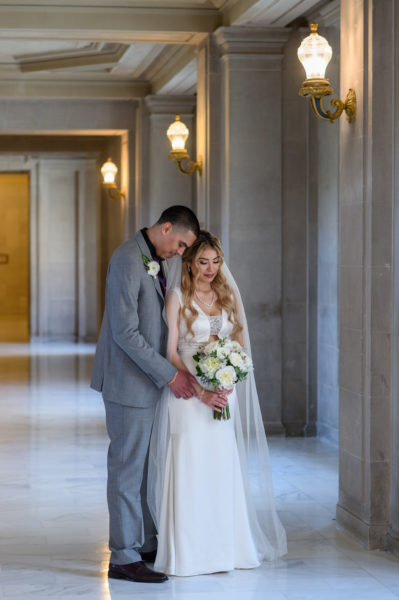 City Hall Bride and groom in Romantic pose in the Summer