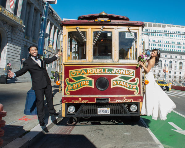 Bride and groom with San Francisco Cable Car