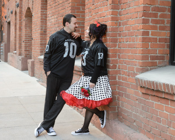 bide and groom in football jerseys