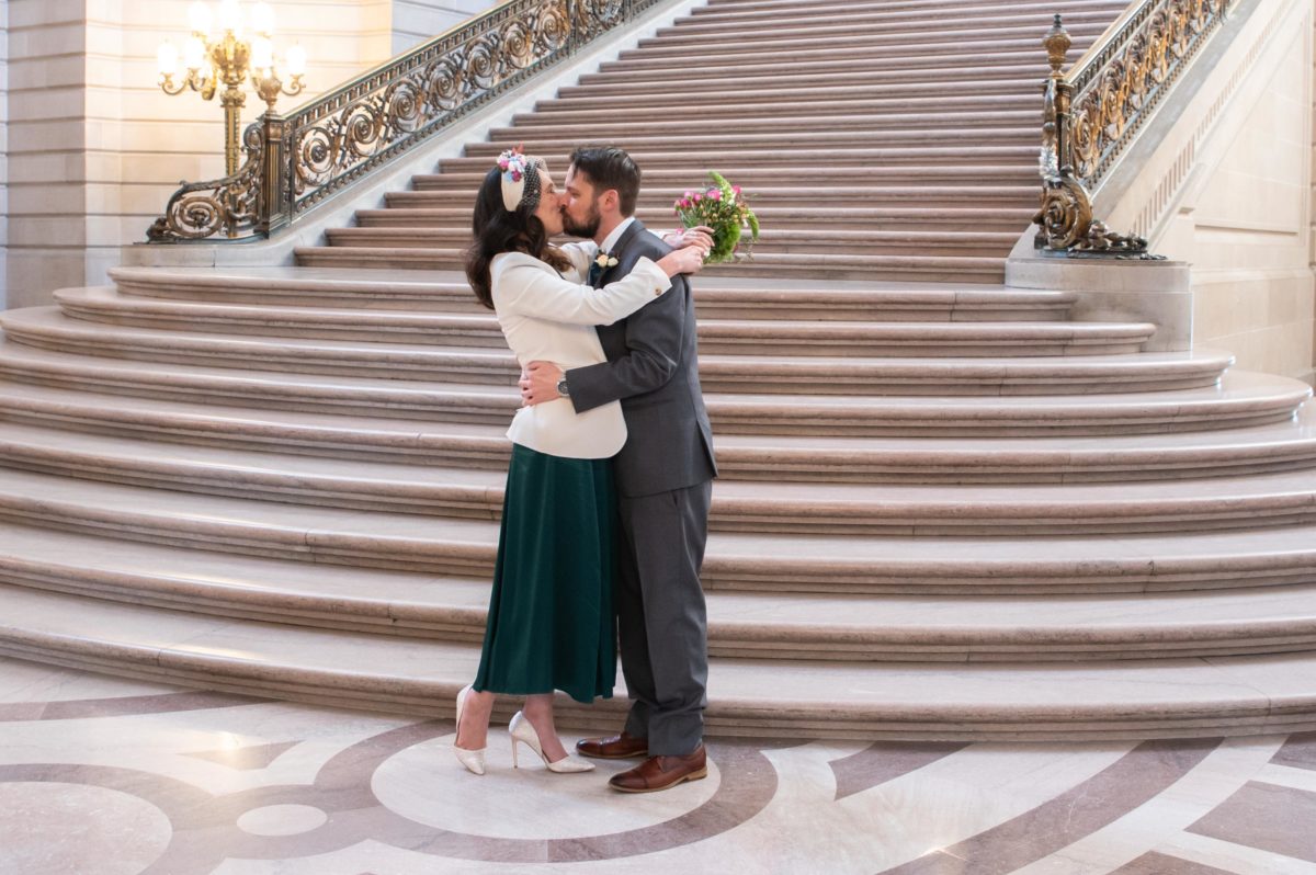 Bride and Groom kissing for wedding photographer in San Francisco