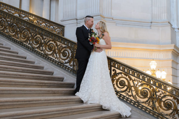 Bride and groom enjoying each other on the Grand Staircase