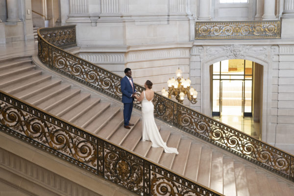 Bride and Groom enjoying the Grand Staircase at San Francisco city hall