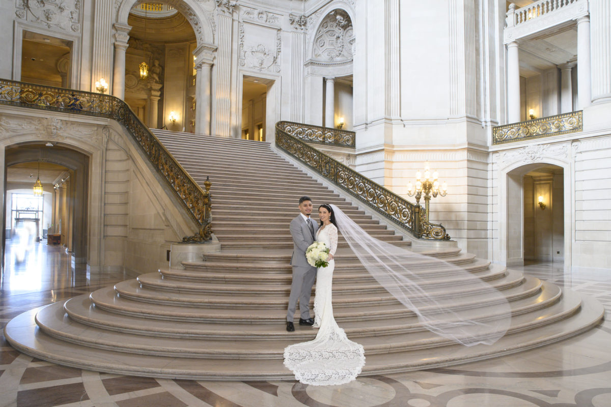 The Grand Staircase with big flowing veil on the bride