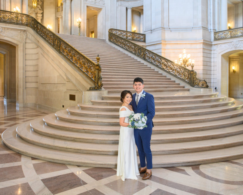 San Francisco city hall bride and groom at the Grand Staircase prior to their wedding reception