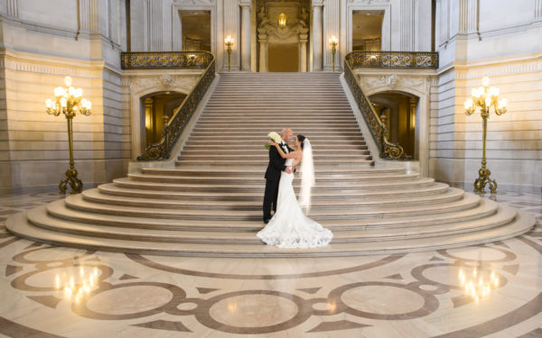 San Francisco City Hall wedding photography with the Grand Staircase and formal couple