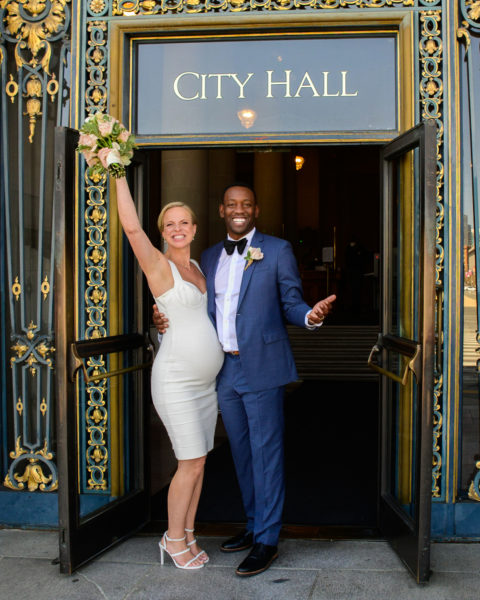 Waving good bye at the city hall entrance.