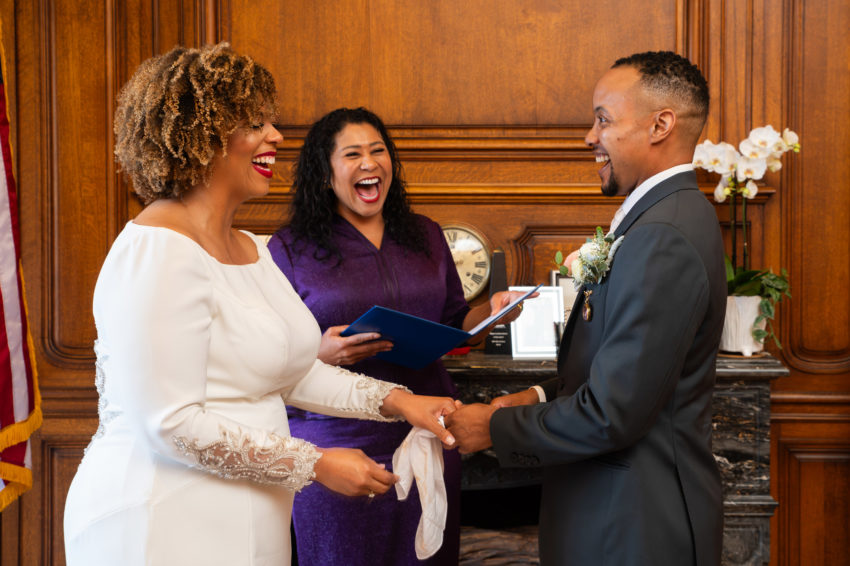 San Francisco Mayor, London Breed officiating a wedding ceremony at City Hall