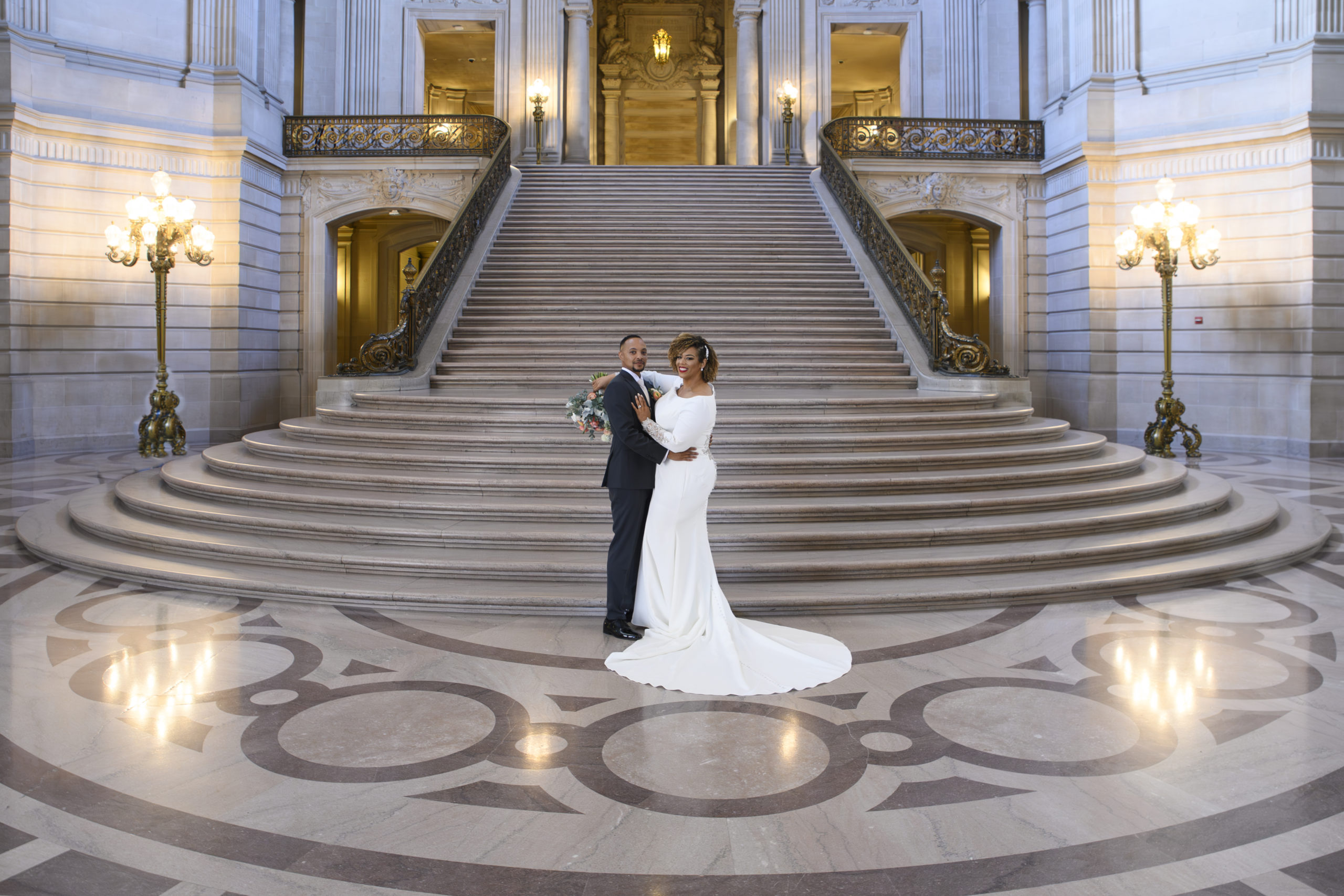 San Francisco city hall bride and groom on the Grand Staircase