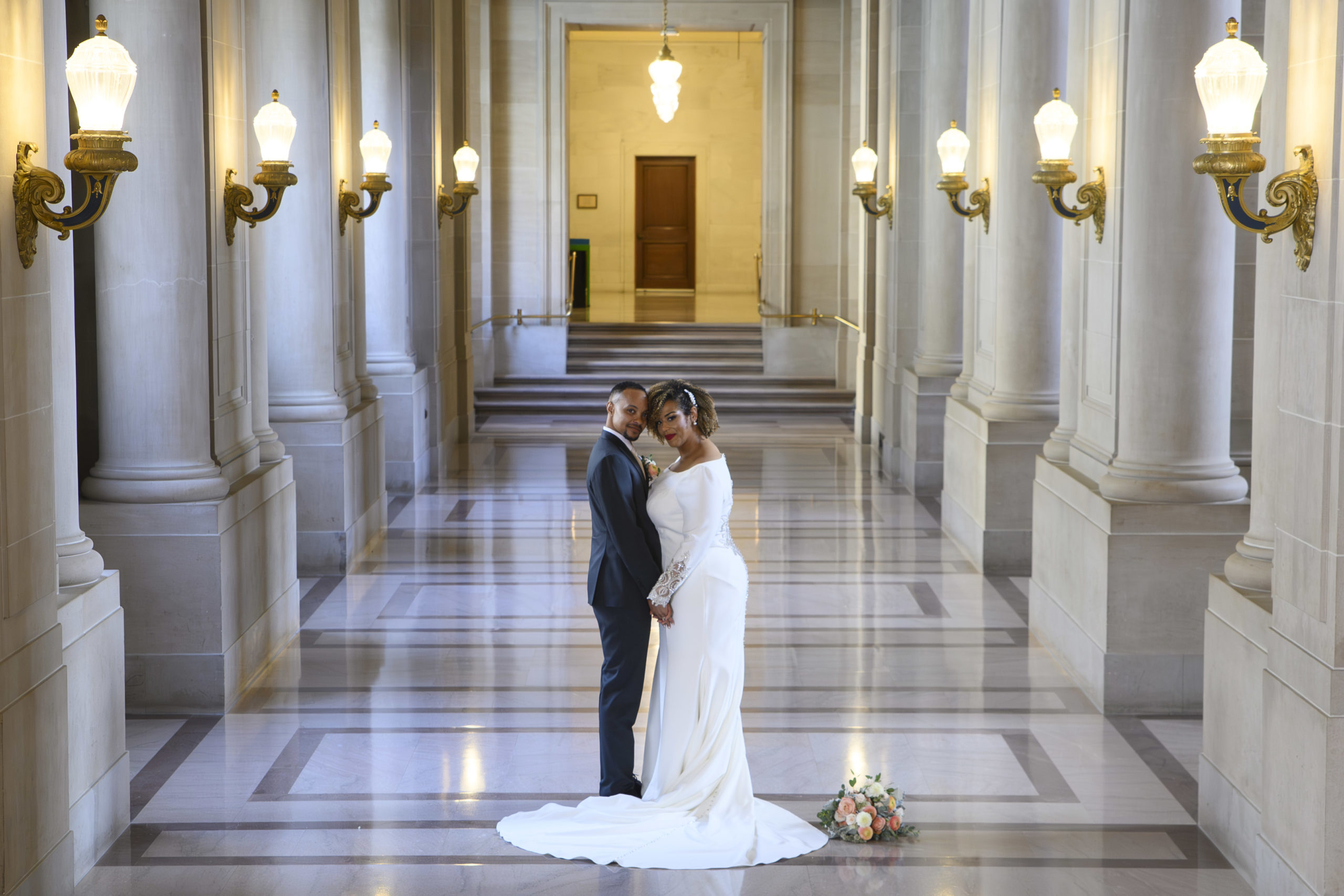 City hall wedding photography on the 2nd floor hallway around the corner from the Rotunda.