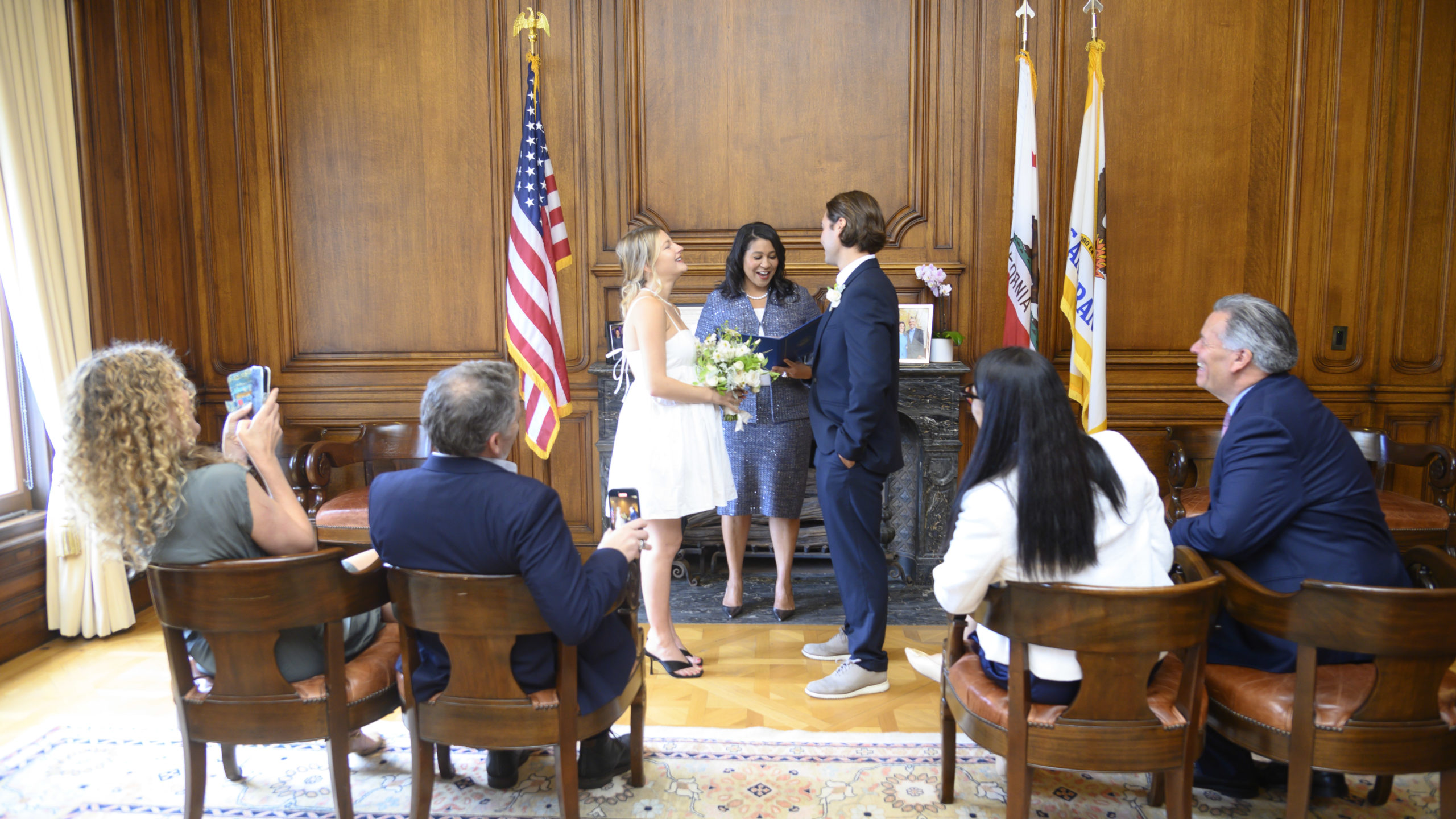 San Francisco Mayor, London Breed performing a civil ceremony in her office