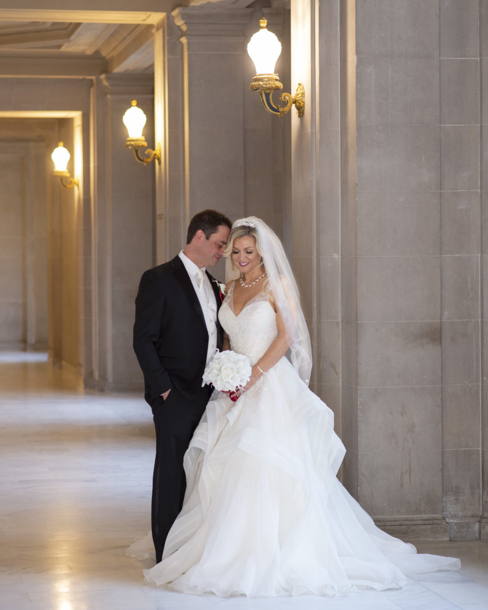 Romantic wedding picture pose on the 3rd Floor at San Francisco city hall