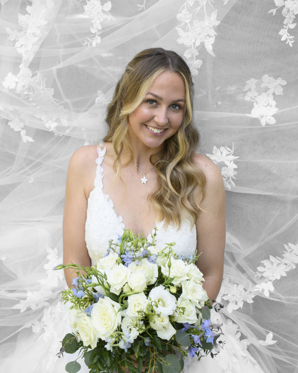 Bridal Prep posed photo of bride getting ready for wedding