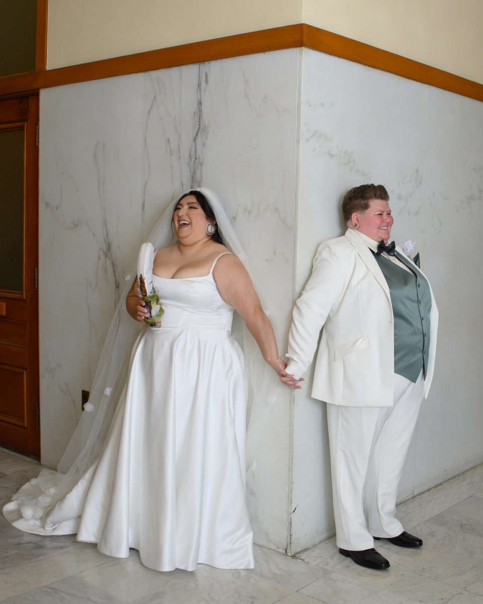 First Touch at San Francisco city hall wedding with Same-Sex couple