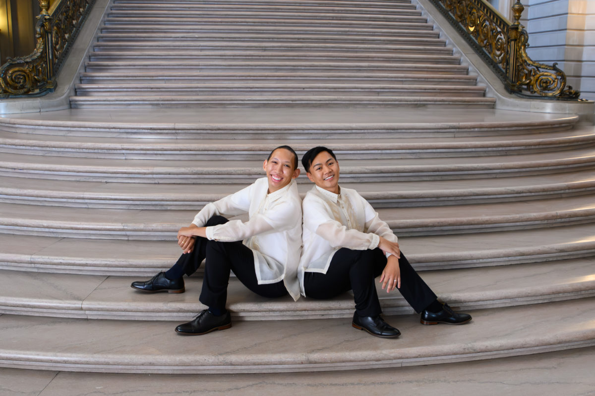 LGBTQ City Hall Grooms posing at SF City Hall
