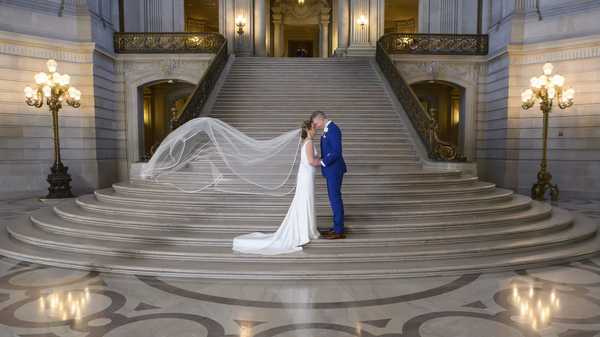Veil blowing at San Francisco city hall elopement wedding