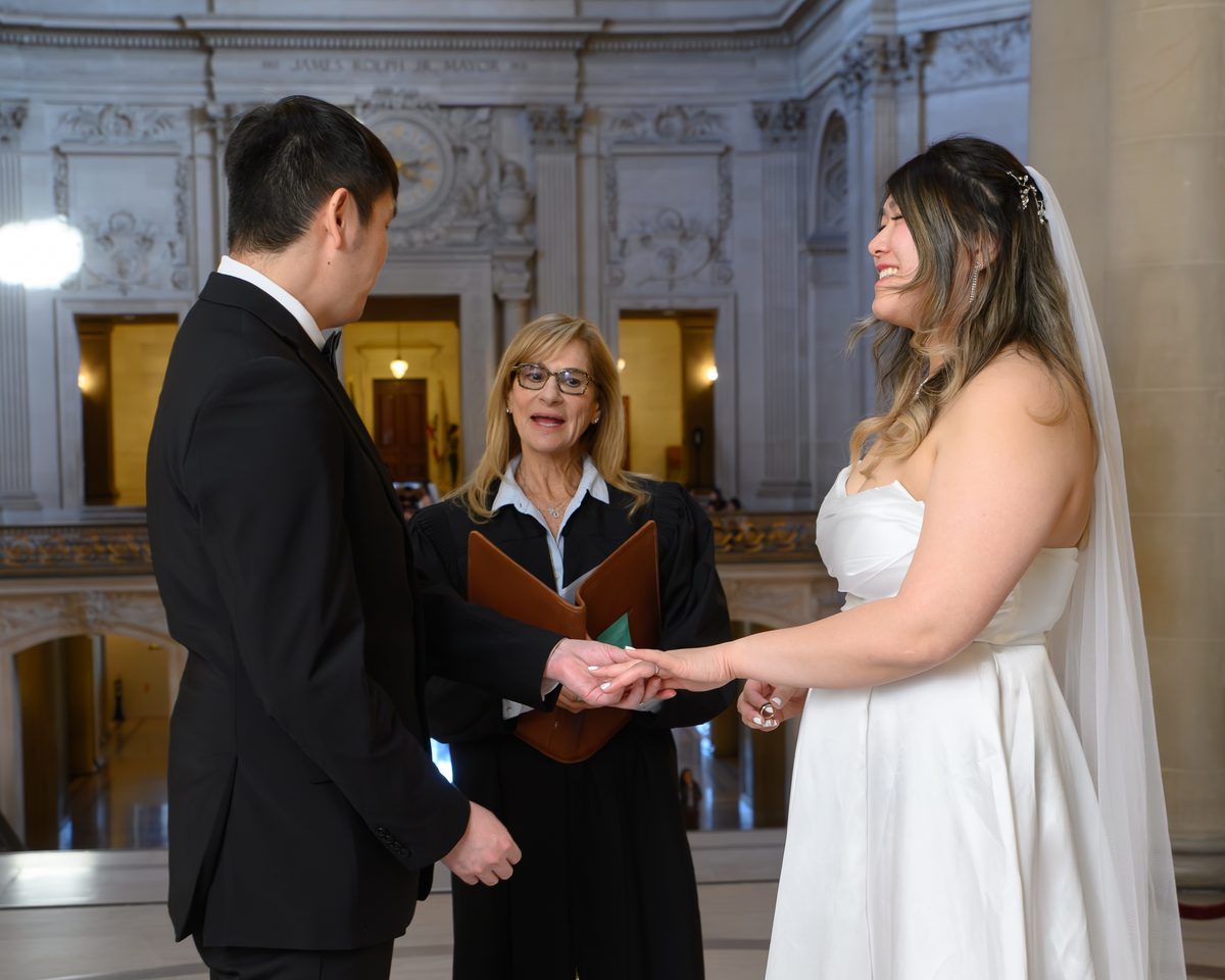 SF City Hall bride and groom reciting their own vows for their marriage