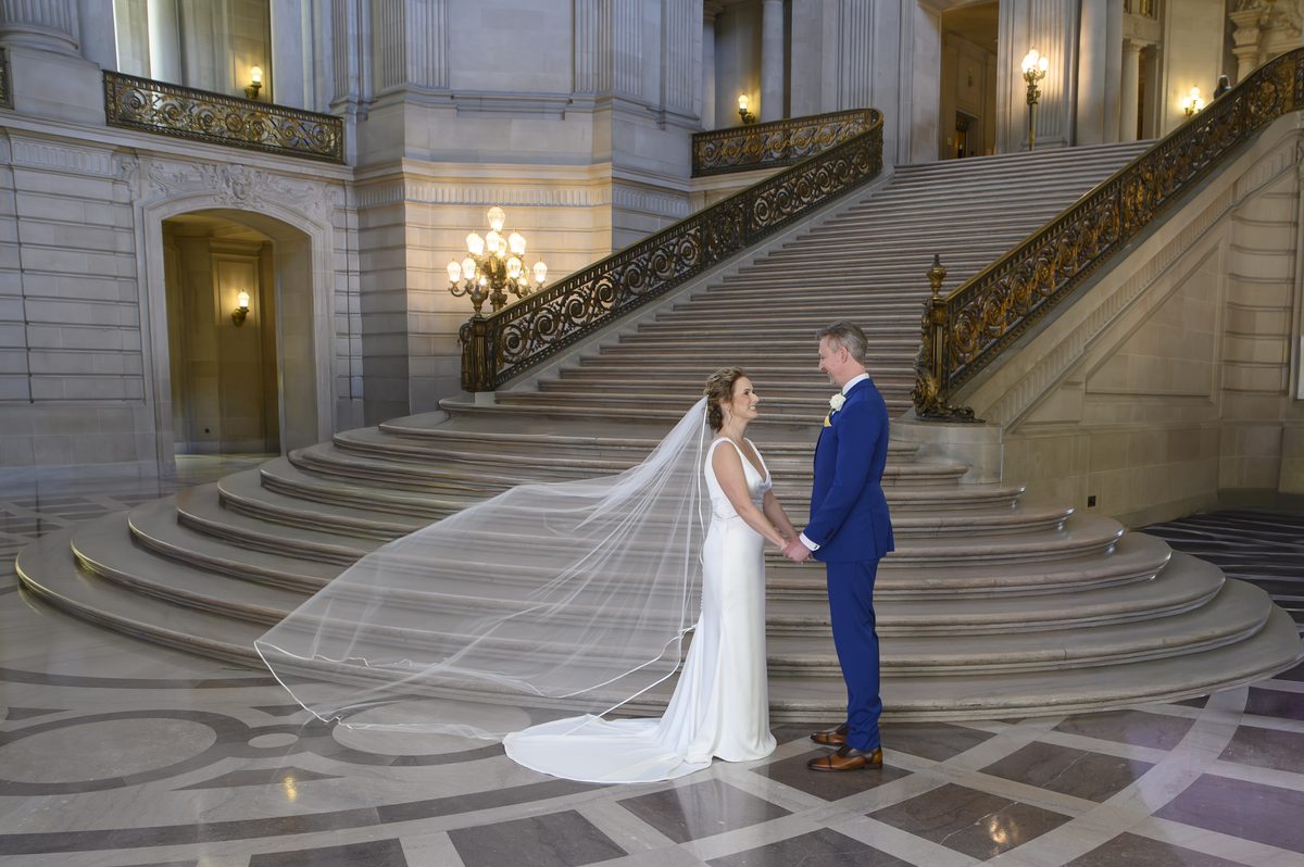 The Grand Staircase at SF City Hall is an amazing place for wedding photography